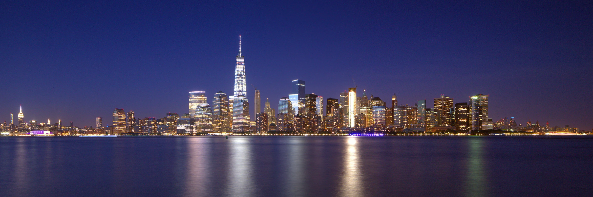 Manhattan skyline at blue hour, across the Hudson River